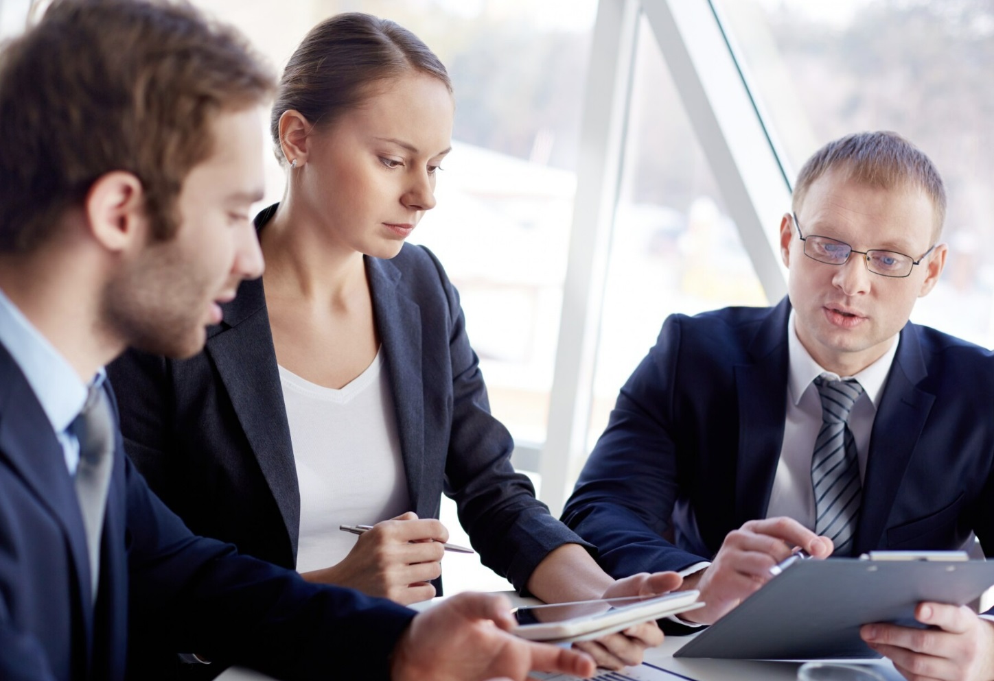 Advisors reviewing a client portfolio together